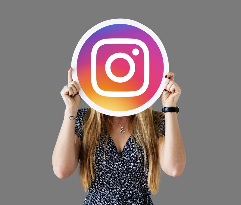 woman-showing-instagram-icon.jpg